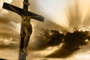 Jesucristo en la Cruz, y el sol entre las nubes y tinieblas