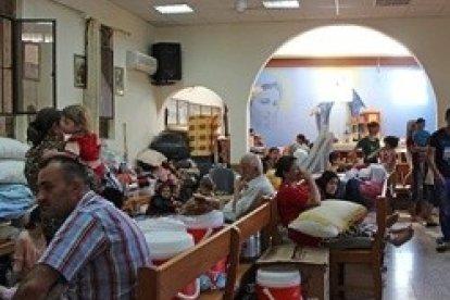 Refugiados iraquíes en una de las parroquias de Erbil, en el Kurdistán