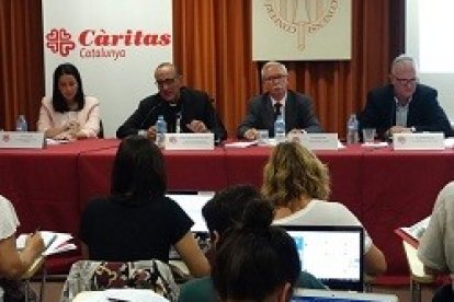 El informe de Cáritas fue presentado por el cardenal Omella en Barcelona