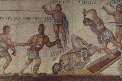 Gladiadores en un mosaico pavimental de los siglos III-IV d.C. Galería Borghese. La brutalidad y crueldad de este espectáculo se había hecho hábito en el Imperio hasta que acabó siendo desterrada por el cristianismo.