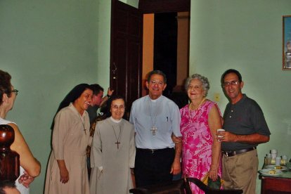 En una reunión con fieles.