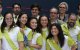 Posan algunos voluntarios de la visita papal en el Centro de Prensa en la Real Casa de Correos de Madrid