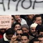 Musulmanes con carteles contra la "islamofobia"