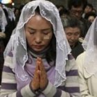 Católicos de Corea del Sur en Misa