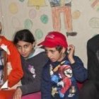 Familia Jadar con un retrato de la niña secuestrada - foto de X.Valladares en El Mundo -