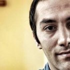 Reza Rahman tuvo que huir del centro de refugiados alemán donde se encontraba, amenazado por sus compañeros por ser cristiano.