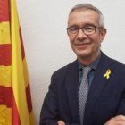 Marcel·lí Joan con el lazo amarillo del independentismo catalán, responsable de Asuntos Religiosos de la Generalitat