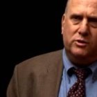 Charles Lewis en 2015 en Sant and Light TV habló del sentido católico del dolor... pero él no deseó ser católico hasta 2006, en Notre Dame de París