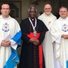 El cardenal Turkson con unos capellanes de pastoral del mar en un encuentro de 2017