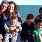 MIlagros, con su marido y sus hijos