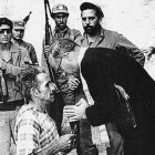 José Ramírez, arrodillado ante el sacerdote Domingo Lorenzo antes de ser asesinado por los comunistas.