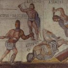 Gladiadores en un mosaico pavimental de los siglos III-IV d.C. Galería Borghese. La brutalidad y crueldad de este espectáculo se había hecho hábito en el Imperio hasta que acabó siendo desterrada por el cristianismo.