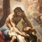 Una bella expresión del amor de Dios: el abrazo místico de San Bernardo a Jesús Crucificado, retablo en la capilla de San Francisco de la iglesia de San Bernardo alle Terme, en Roma.