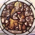 El santo rodeado de racimos de uvas.