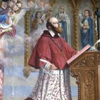 San Francisco de Sales en oración.