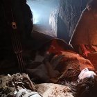 Un enterramiento prehistórico con un túnel de luz, escena de la miniserie Buscando la Luz, sobre experiencias cercanas a la muerte