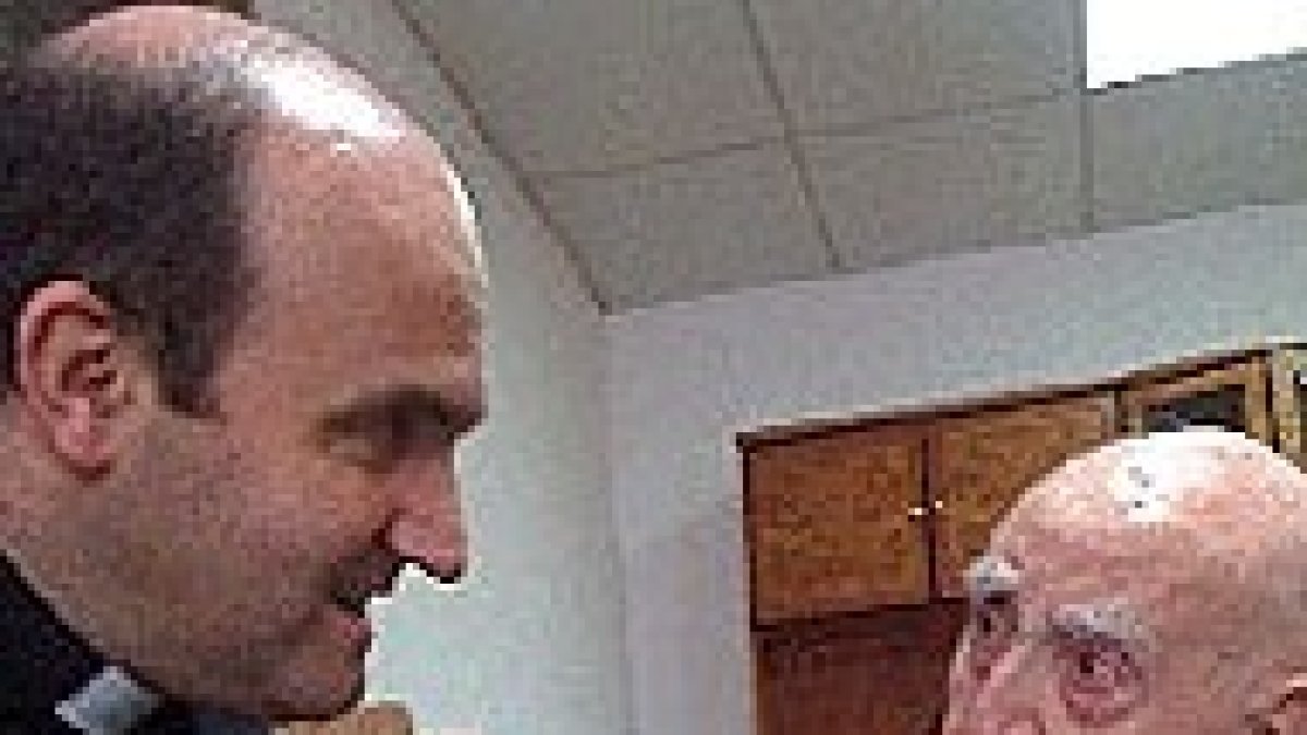 Don Román con monseñor Munilla.