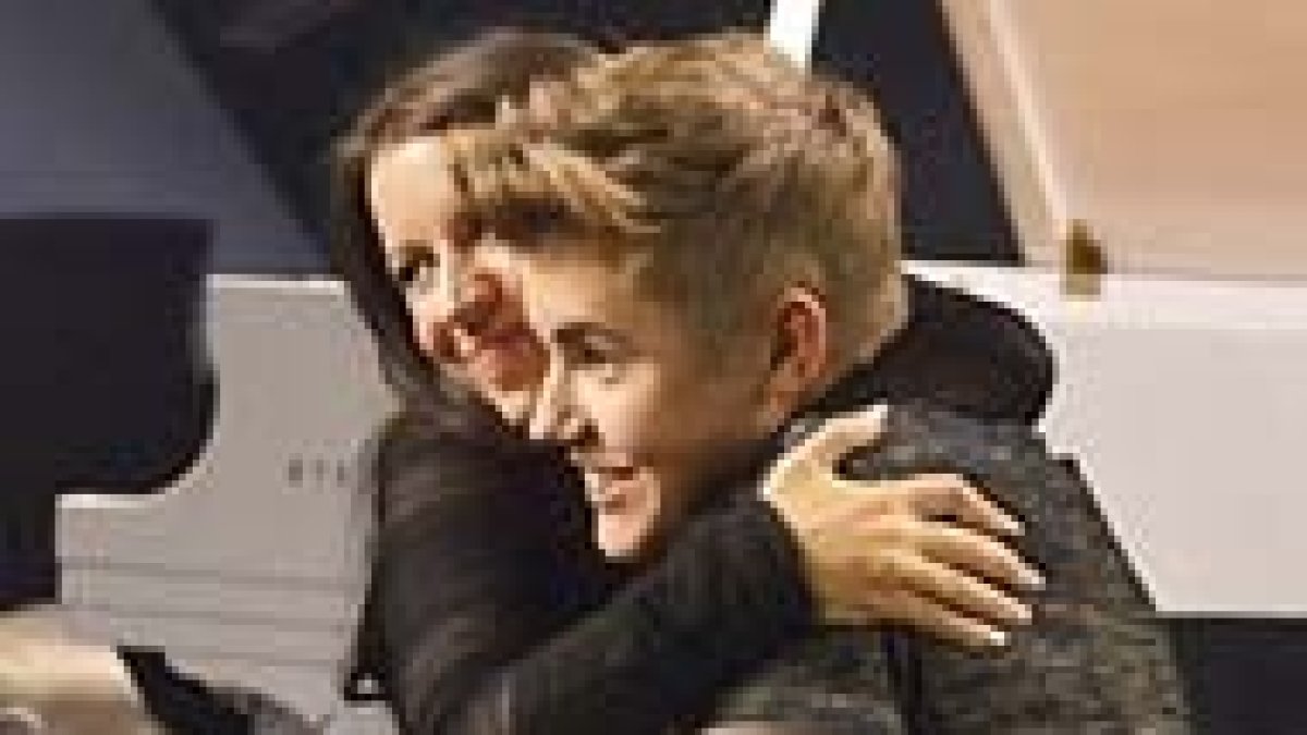 Justin Bieber con su madre.