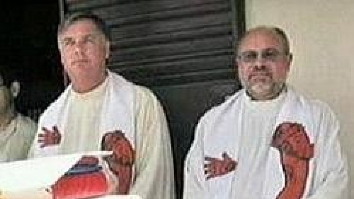 Los dos misioneros italianos secuestrados, los padres Martha y Allegri