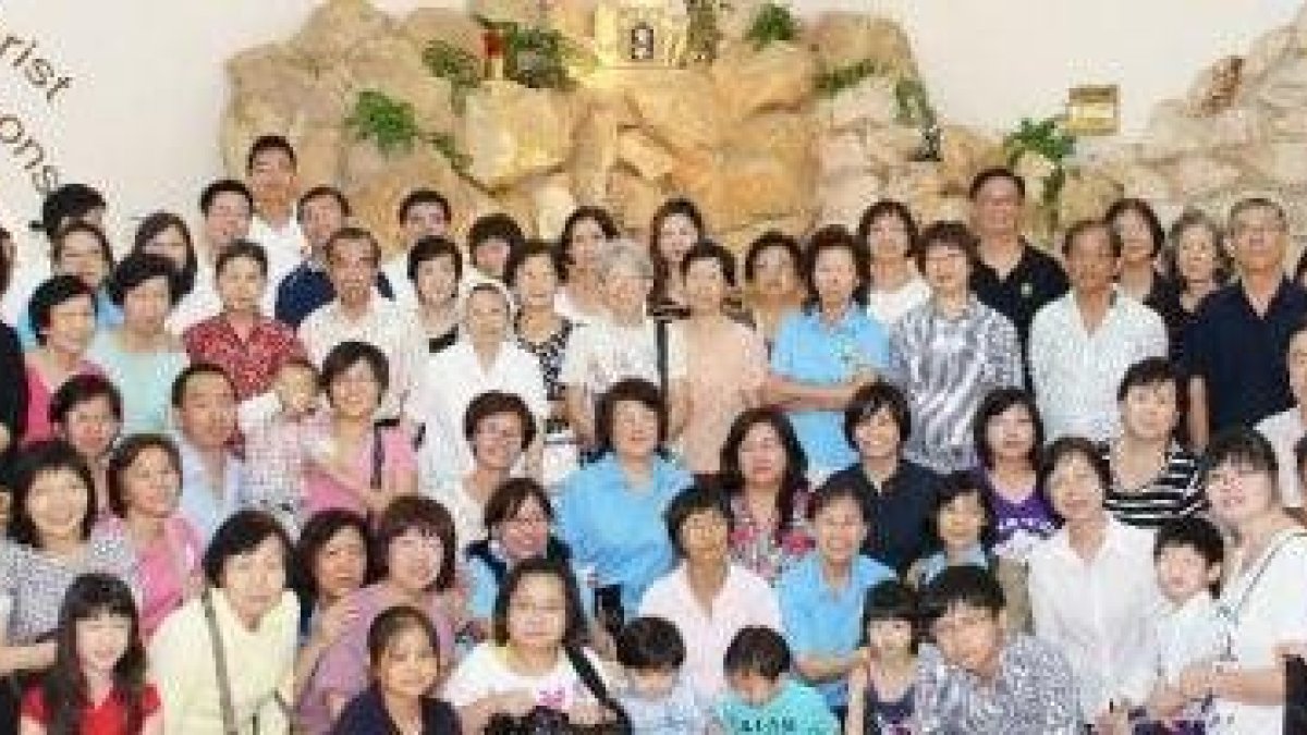 Catecúmenos chinos adultos en la parroquia de Novena, en Singapur, donde Andrew es catequista