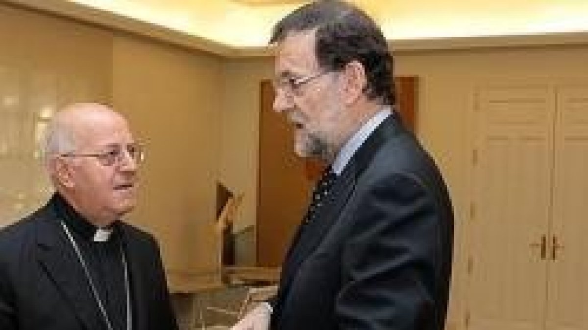 El presidente de la Conferencia Episcopal, Ricardo Blázquez con el presidente del gobierno, Mariano Rajoy
