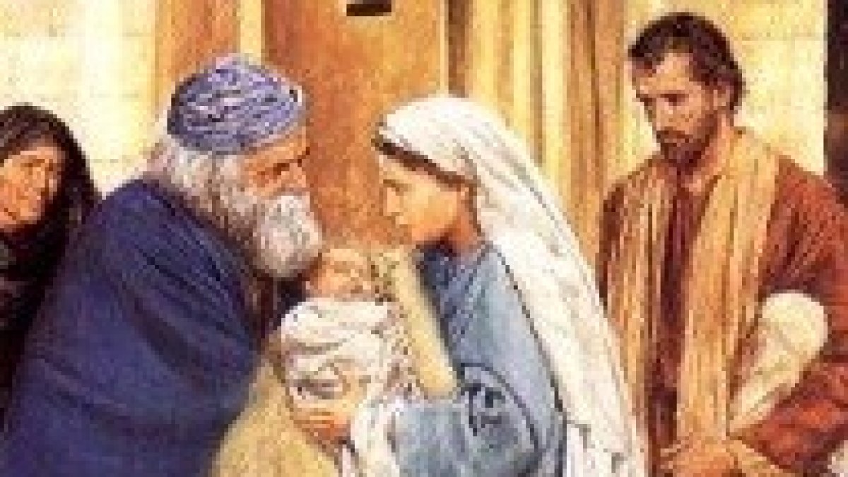 Simeón lo tomó en brazos y bendijo a Dios .