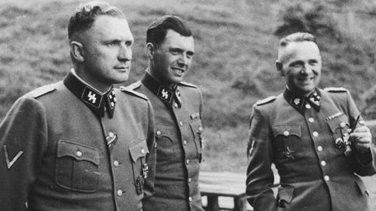 De izquierda a derecha: Richard Baer, Josef Mengele y Rudolf Höss, principales responsables del campo de Auschwitz