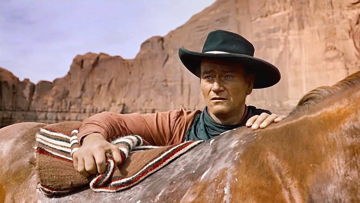 John Wayne en «Centauros del desierto [The Searches]» (1956) de John Ford, una de las mejores películas de ambos y fija en casi todos los Top Ten de la historia del cine.