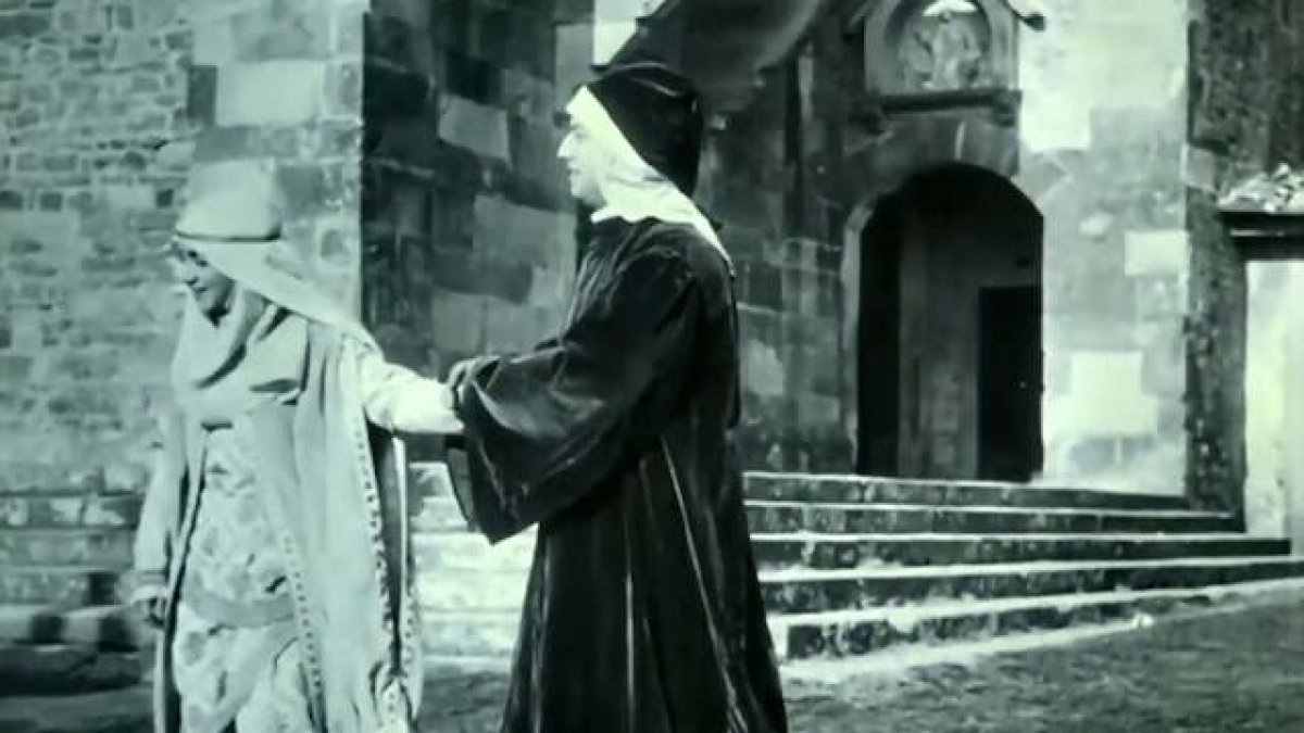 Dante (Oreste Grandi) declara su amor a Beatriz (Fernanda Negri Pouget) en una escena de «Date e Beatrice», película muda dirigida en 1913 por Mario Caserini.