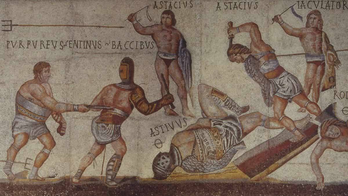 Gladiadores en un mosaico pavimental de los siglos III-IV d.C. Galería Borghese. La brutalidad y crueldad de este espectáculo se había hecho hábito en el Imperio hasta que acabó siendo desterrada por el cristianismo.