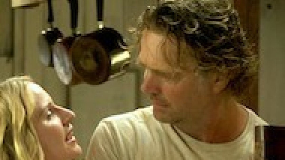 John Schneider y Jenn Gotzon.