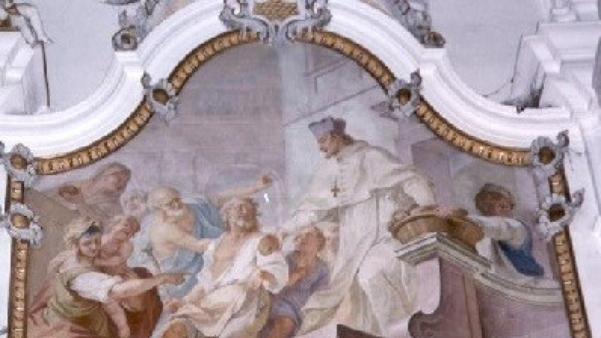 San Siard ejerciendo la caridad.