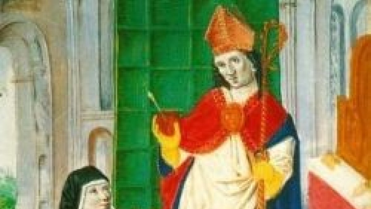 San Agustín le muestra su corazón trasverberado.